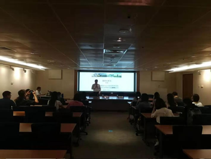 Students in discussion in an HDB meeting room